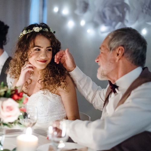 Grandfather Congratulating Granddaughter On Marriage